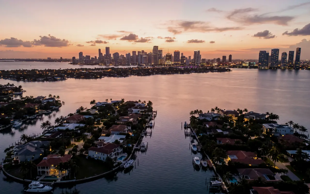 Aerial view of waterfront islands, canals and boats at sunset